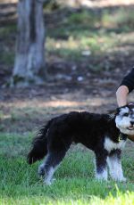 JAMIE CHUNG with Her Dog at a Park in British Columbia 09/30/2015