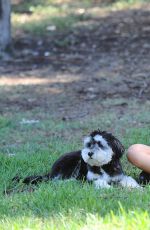 JAMIE CHUNG with Her Dog at a Park in British Columbia 09/30/2015