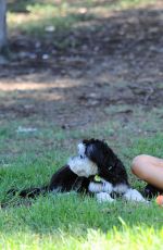 JAMIE CHUNG with Her Dog at a Park in British Columbia 09/30/2015