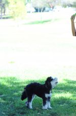 JAMIE CHUNG with Her Dog at a Park in British Columbia 09/30/2015