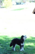 JAMIE CHUNG with Her Dog at a Park in British Columbia 09/30/2015