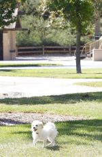 KALEY CUOCO Walks Her Dog Out at a Park in Los Angeles 09/27/2015