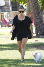 KALEY CUOCO Walks Her Dog Out at a Park in Los Angeles 09/27/2015