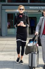 KARLIE KLOSS at Heathrow Airport in London 09/29/2015