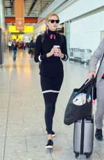 KARLIE KLOSS at Heathrow Airport in London 09/29/2015