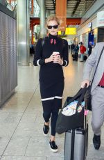 KARLIE KLOSS at Heathrow Airport in London 09/29/2015
