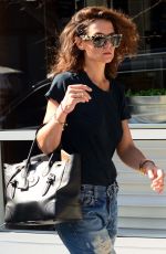 KATIE HOLMES in Ripped Jeans Out in Santa Monica 09/23/2015