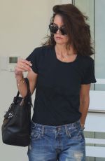 KATIE HOLMES in Ripped Jeans Out in Santa Monica 09/23/2015