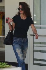 KATIE HOLMES in Ripped Jeans Out in Santa Monica 09/23/2015