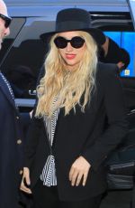 KESHA SEBERT Arrives at LAX Airport in Los Angeles 09/18/2015