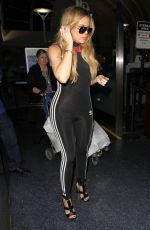 KHLOE KARDASHIAN in Tights at LAX Airport in Los Angeles 09/16/2015