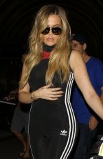 KHLOE KARDASHIAN in Tights at LAX Airport in Los Angeles 09/16/2015