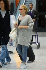 KYLIE MINOGUE Arrives at Heathrow Aiport in London 08/29/2015