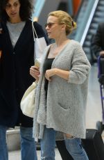 KYLIE MINOGUE Arrives at Heathrow Aiport in London 08/29/2015