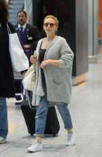 KYLIE MINOGUE Arrives at Heathrow Aiport in London 08/29/2015