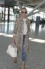 KYLIE MINOGUE at Heathrow Aiport in London 08/28/2015