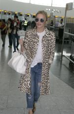 KYLIE MINOGUE at Heathrow Aiport in London 08/28/2015