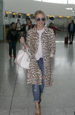 KYLIE MINOGUE at Heathrow Aiport in London 08/28/2015