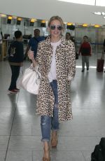 KYLIE MINOGUE at Heathrow Aiport in London 08/28/2015