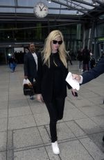 LARA STONE at Heathrow Airport in London 09/13/2015