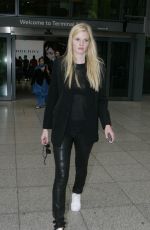LARA STONE at Heathrow Airport in London 09/13/2015
