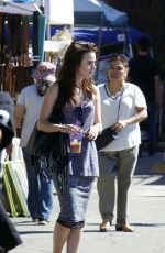 LILY COLLINS Shopping at Flea Market in Los Angeles 09/13/2015