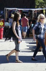 LILY COLLINS Shopping at Flea Market in Los Angeles 09/13/2015