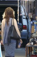 LILY COLLINS Shopping at Flea Market in Los Angeles 09/13/2015
