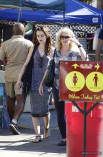 LILY COLLINS Shopping at Flea Market in Los Angeles 09/13/2015