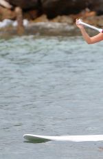 LUCY MECKLENBURGH in Red Swimsuit Paddleboarding in Spain 09/05/2015