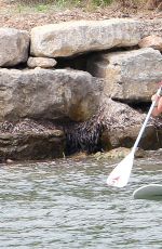 LUCY MECKLENBURGH in Red Swimsuit Paddleboarding in Spain 09/05/2015