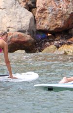 LUCY MECKLENBURGH in Red Swimsuit Paddleboarding in Spain 09/05/2015