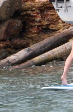 LUCY MECKLENBURGH in Red Swimsuit Paddleboarding in Spain 09/05/2015