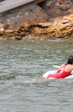 LUCY MECKLENBURGH in Red Swimsuit Paddleboarding in Spain 09/05/2015