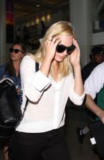 MARGOT ROBBIE at Los Angeles International Airport 09/12/2015