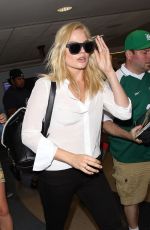 MARGOT ROBBIE at Los Angeles International Airport 09/12/2015