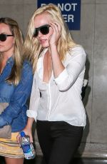 MARGOT ROBBIE at Los Angeles International Airport 09/12/2015