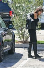 MICHELLE RODRIGUEZ Riding Her Bike Out in Malibu 09/18/2015