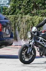 MICHELLE RODRIGUEZ Riding Her Bike Out in Malibu 09/18/2015