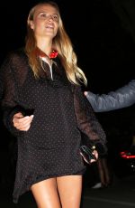 NATASHA POLY Leaves Versace Fashion Show in Milan 09/25/2015