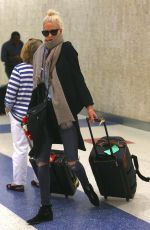 POPPY DELEVINGNE Arrives at JFK Airport in New York 09/10/2015
