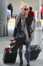 POPPY DELEVINGNE Arrives at JFK Airport in New York 09/10/2015