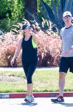 REESE WITHERSPOON in Tights Out Jogging in Santa Monica 09/20/2015