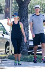 REESE WITHERSPOON in Tights Out Jogging in Santa Monica 09/20/2015