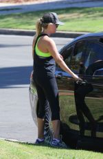 REESE WITHERSPOON in Tights Out Jogging in Santa Monica 09/20/2015