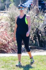 REESE WITHERSPOON in Tights Out Jogging in Santa Monica 09/20/2015