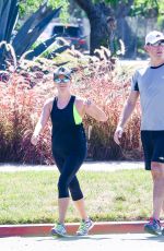 REESE WITHERSPOON in Tights Out Jogging in Santa Monica 09/20/2015