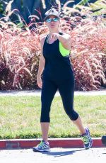 REESE WITHERSPOON in Tights Out Jogging in Santa Monica 09/20/2015