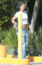 RIHANNA in Ripped Jeans Out in Los Angeles 09/06/2015