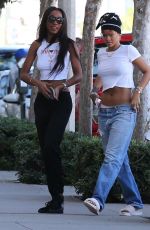 RIHANNA in Ripped Jeans Out in Los Angeles 09/06/2015